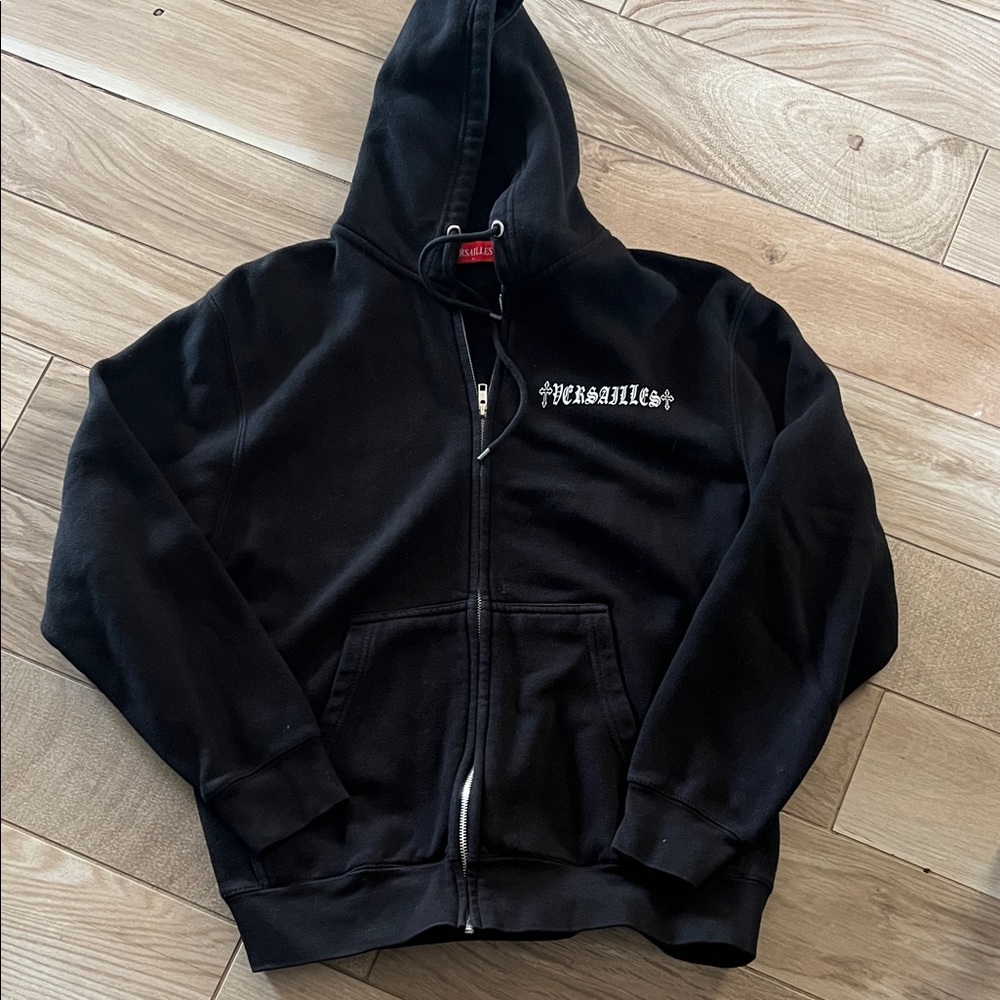Men’s black zip-up Versailles Clothing hoodie 
With rhinestone design